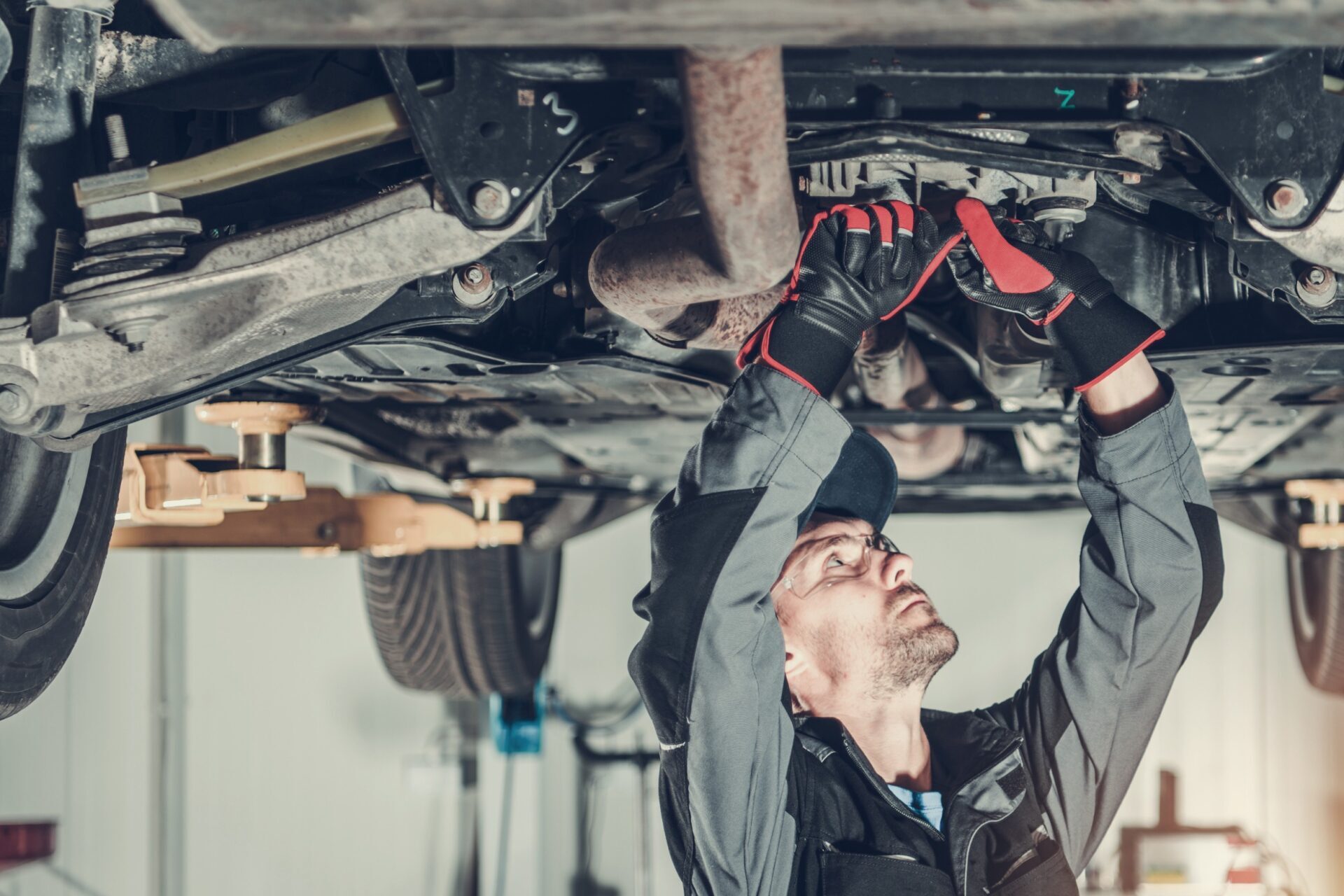 person working on car under